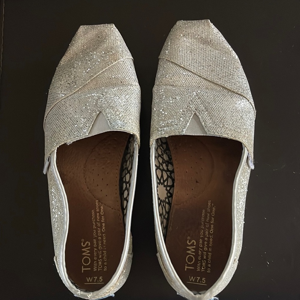 Tom’s classics silver glitter shoes.